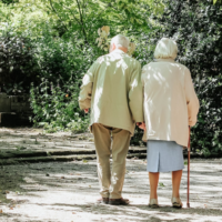 Elderly couple walking in the park