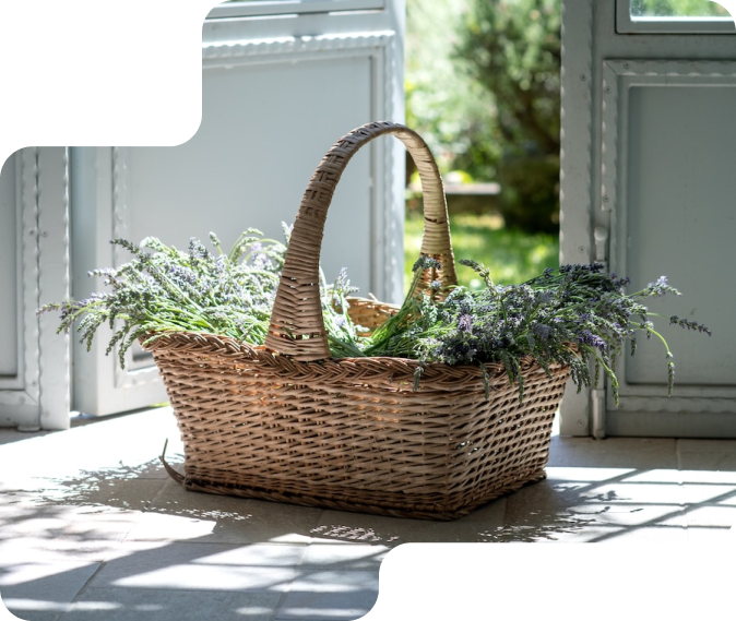 A basket with some grass and lavender