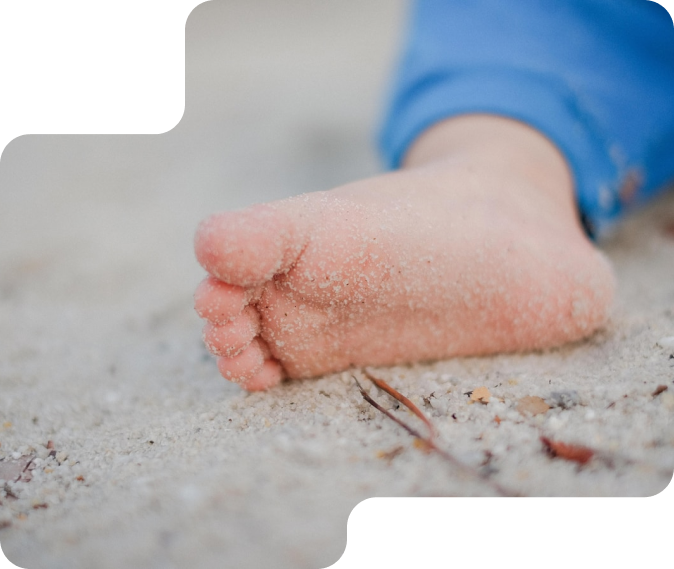 Baby feet on sand